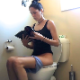 A skinny, but attractive girl on her period sits on a toilet, reads a book, pushes, takes a shit with a couple of audible plops. She complains about the smell and then wipes. Presented in 720P HD. Over 5.5 minutes.